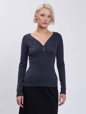 Influencer - Jersey en azul: frente
