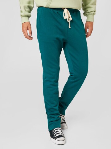 Urban Classics Regular Trousers in Green: front