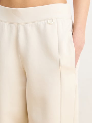 NIKE Tapered Παντελόνι φόρμας '24.7' σε μπεζ