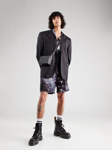 Loosefit Pantalon Carlo Colucci en noir