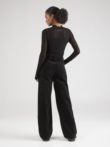 florence by mills exclusive for ABOUT YOU Wide leg Pants 'Poinsettia' in Black