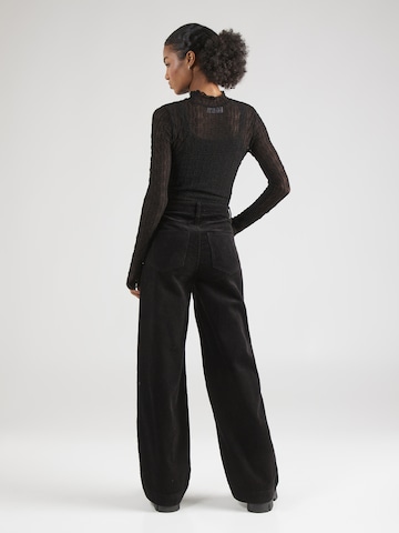 florence by mills exclusive for ABOUT YOU Wide leg Broek 'Poinsettia' in Zwart