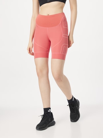 Regular Pantalon de sport NIKE en orange : devant