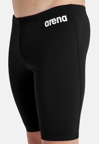 ARENA Bathing trunks 'TEAM SWIM JAMMER SOLID' in Black