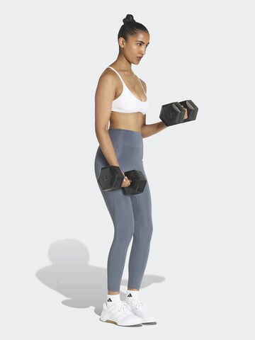 ADIDAS PERFORMANCE Skinny Sportbroek 'Optime Power Essentials' in Blauw