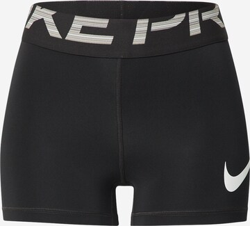 Pantaloni sport de la NIKE pe negru: față