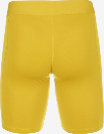 Skinny Pantaloncini intimi sportivi di NIKE in giallo