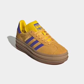 ADIDAS ORIGINALS Sneakers in Yellow: front