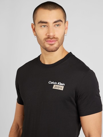 Calvin Klein Jeans T-shirt 'STACKED BOX' i svart