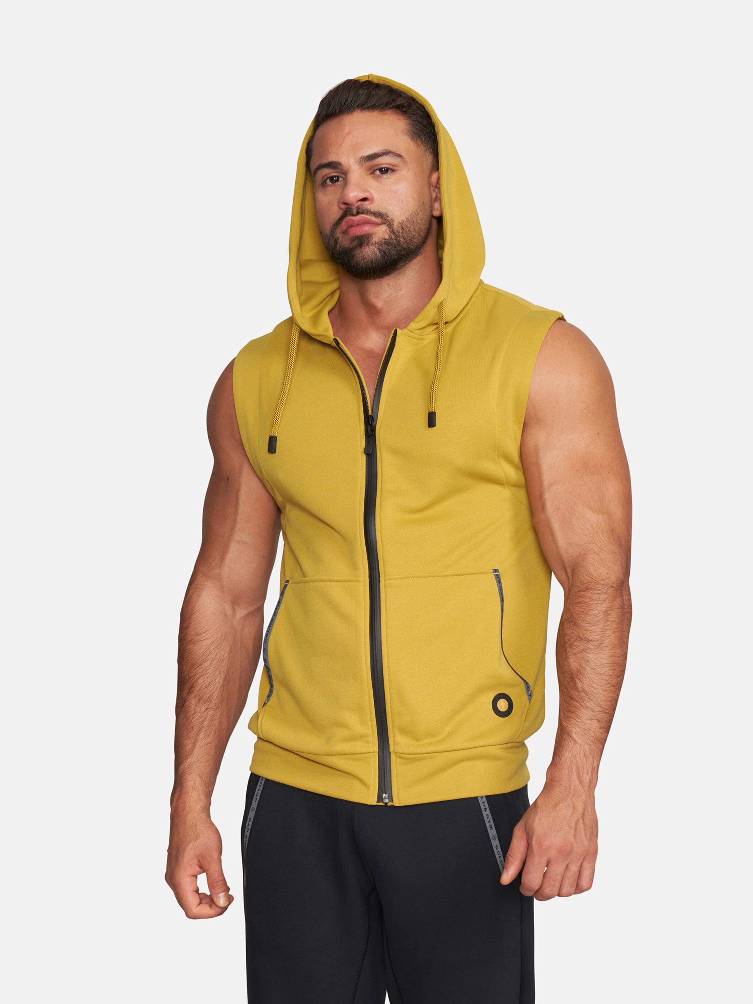 Gilet de sport DRAPER GOLD S GYM APPAREL en Moutarde Jaune Pastel ABOUT YOU