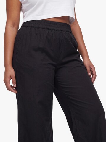 Largi Pantaloni 'CARPAULA' de la ONLY Carmakoma pe negru