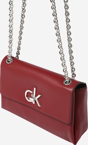 Calvin Klein Чанта за през рамо тип преметка в червено: отпред