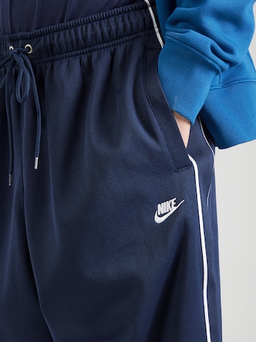 Nike Sportswear Loosefit Housut 'CLUB' värissä sininen