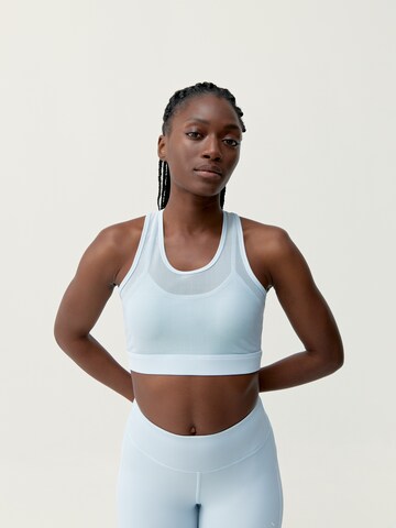 Born Living Yoga Sports Top 'Daya' in Blue: front