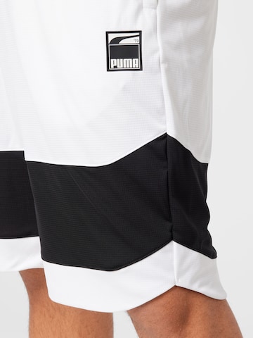 PUMA Loose fit Sports trousers in White