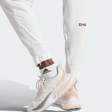 Tapered Pantaloni sportivi 'Z.N.E.' di ADIDAS SPORTSWEAR in bianco