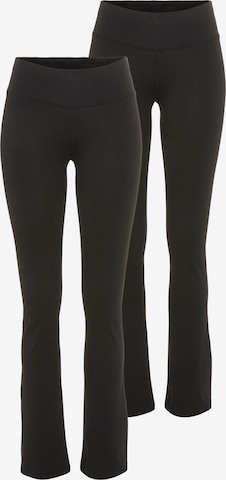 FAYN SPORTS Flared Workout Pants in Black: front