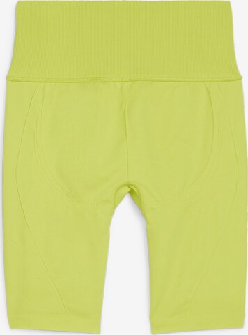 Skinny Pantalon de sport PUMA en vert