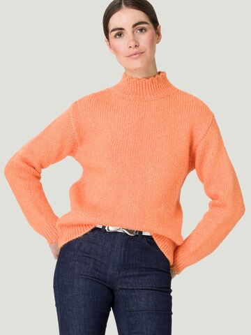 Pullover di zero in arancione: frontale