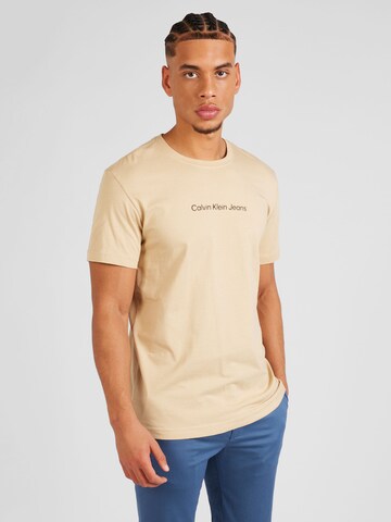 Calvin Klein Jeans - Camisa em bege: frente