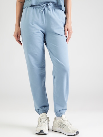 UNDER ARMOUR - Tapered Pantalón deportivo en azul: frente
