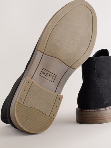 Next Chukka Boots in Schwarz