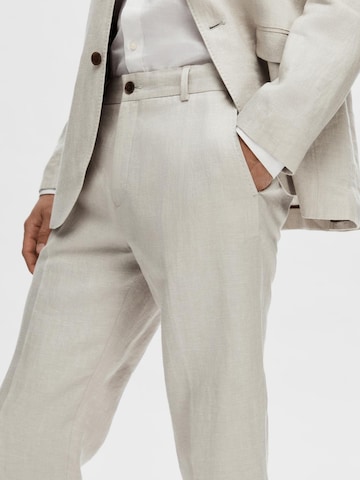 Regular Pantalon à plis 'Will' SELECTED HOMME en beige