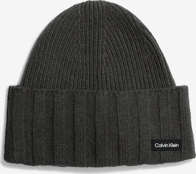 Megzta kepurė iš Calvin Klein, spalva – rusvai žalia, Prekių apžvalga