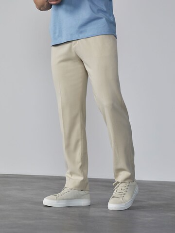 DAN FOX APPAREL Regular Trousers with creases 'Tiago' in Beige: front