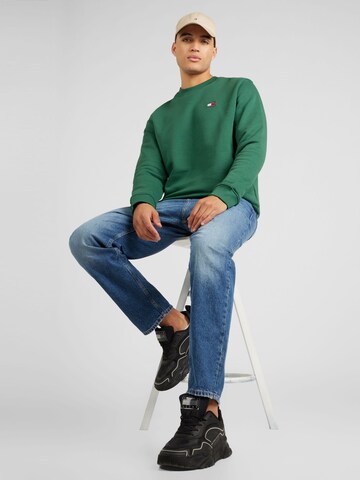 Bluză de molton de la Tommy Jeans pe verde