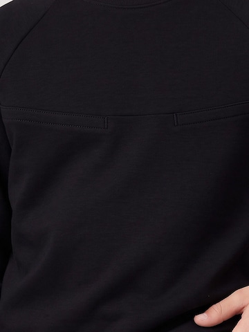 Tommy Life Strój treningowy 'TOMMY Kinder Active Set' w kolorze czarny