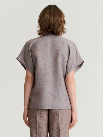 TATUUM - Blusa en marrón