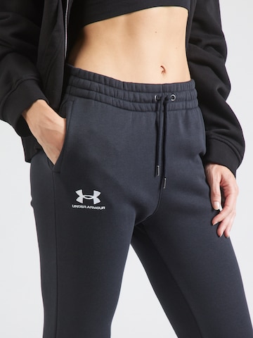 UNDER ARMOUR Tapered Παντελόνι φόρμας σε μαύρο