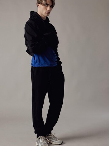 regular Pantaloni 'Joggers Felpati' di OWN Off With Nature in nero