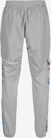 ADIDAS PERFORMANCE Tapered Sportbroek 'YOT Trae Young' in Grijs
