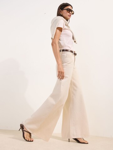 smėlio Friends Like These Plačios klešnės Džinsai