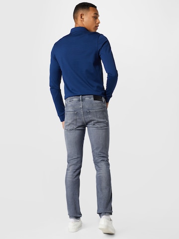 Slimfit Jeans 'Delaware' de la BOSS Black pe gri