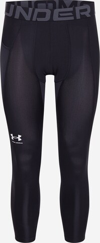 UNDER ARMOUR Workout Pants in Black: front