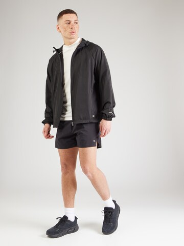 Champion Authentic Athletic Apparel Between-season jacket in Black