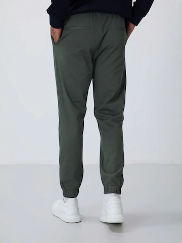 Tapered Pantaloni di Tommy Life in verde