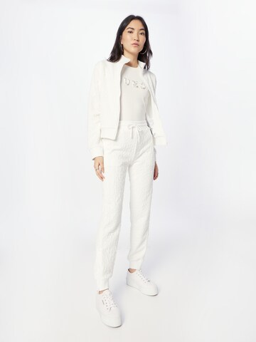 GUESS Tapered Sporthose 'CARINE' in Weiß