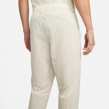 NIKE Tapered Outdoor Pants 'FC' in Beige