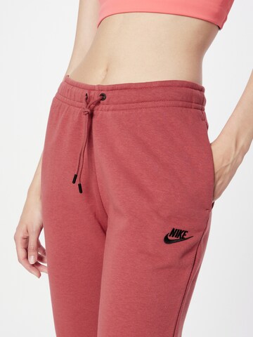 Nike Sportswear Tapered Nadrág 'EMEA' - piros