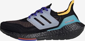 ADIDAS PERFORMANCE Athletic Shoes in Black: front