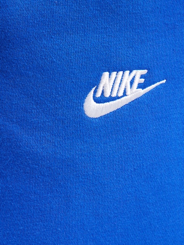 Nike SportswearTapered Hlače 'CLUB' - plava boja