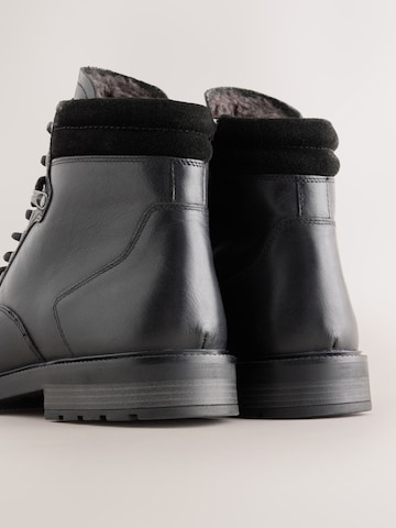 Next - Botas con cordones en negro