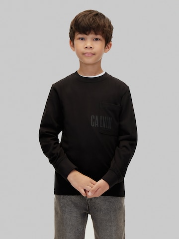 Pull-over Calvin Klein Jeans en noir : devant