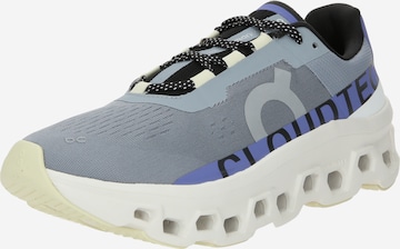 On - Zapatillas de running 'Cloudmonster' en gris: frente