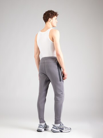 Nike Sportswear Конический (Tapered) Штаны 'TCH FLC' в Серый