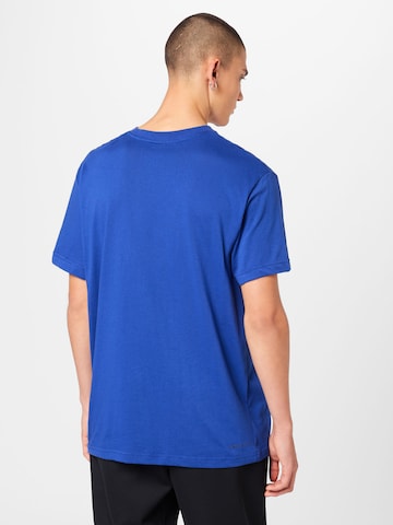 Nike Sportswear - Camisa em azul